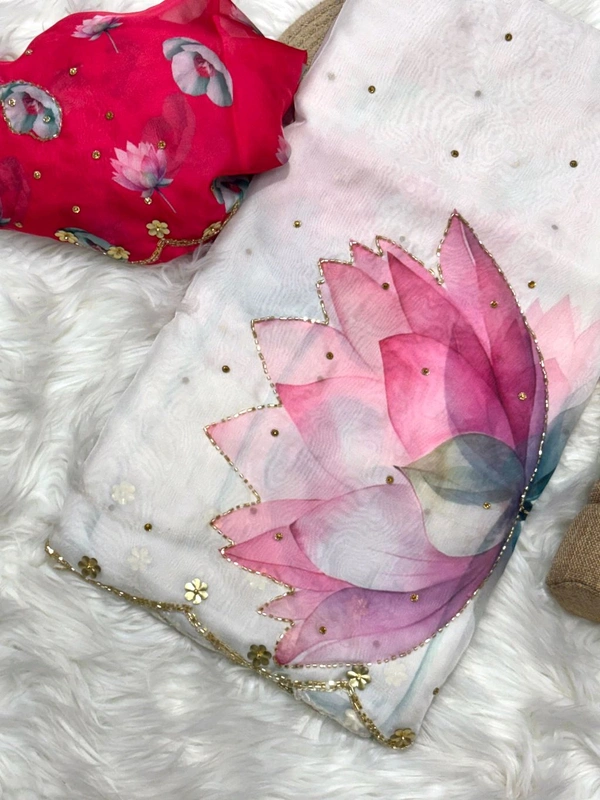 *Pure soft teby silk saree with beautiful digital prints flower nd hand cutdana work heavy outing border in all over saree ,paired with digital fabric with khatli sleeves pattern blouse*