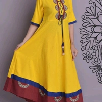 Women Rayon Slub Flared Printed Yellow Kurti - all