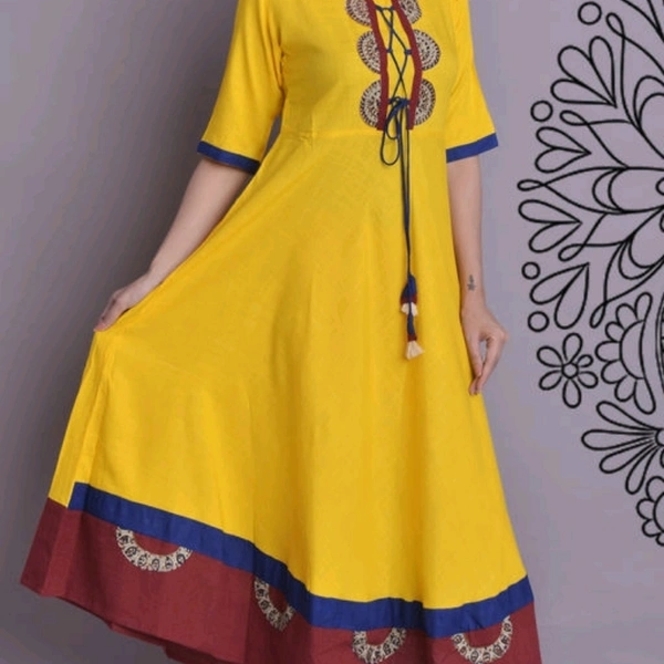 Women Rayon Slub Flared Printed Yellow Kurti - all