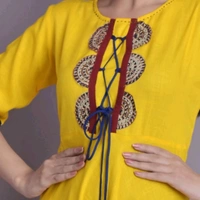 Women Rayon Slub Flared Printed Yellow Kurti - all