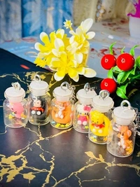 Cute Mini Bottle Keychains – Cartoon Character Charms for Bags & Keys - Random Cartoon (Pack Of 3)