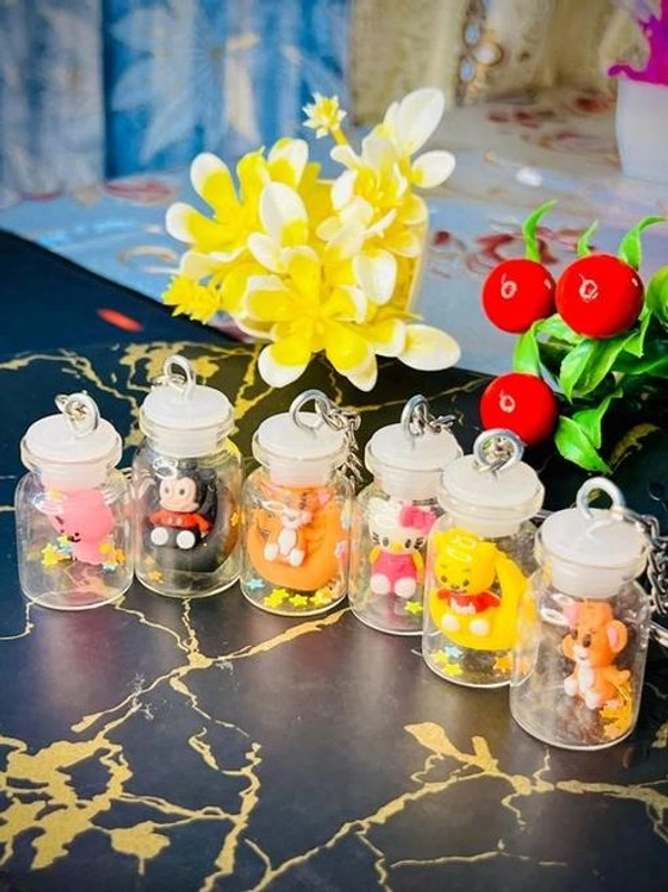 Cute Mini Bottle Keychains – Cartoon Character Charms for Bags & Keys - Random Cartoon (Pack Of 3)