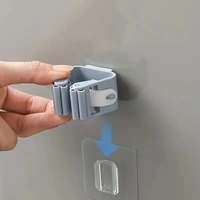SELF ADHESIVE MOP AND BROOM HOLDER