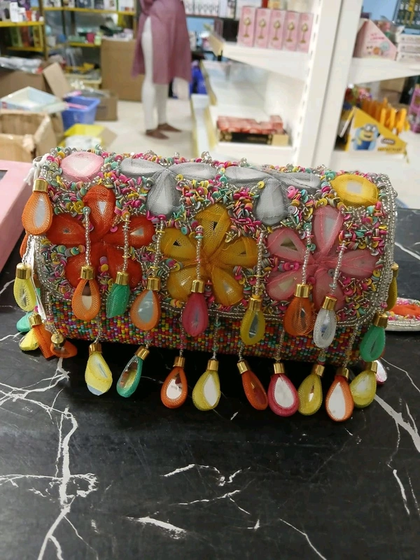 Multicolour Tassels Embellished Clutch