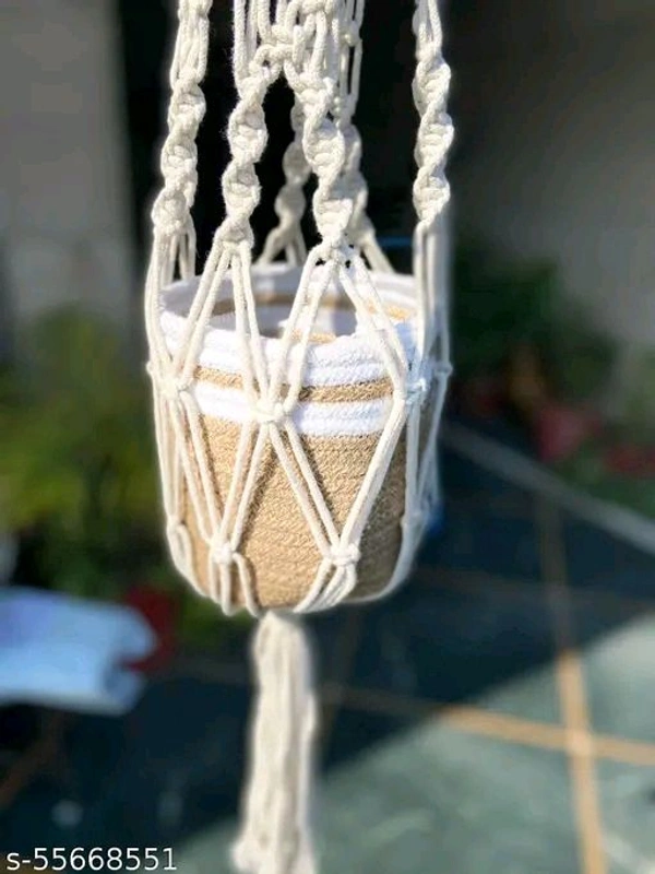 Macrame PCENFAP014 Multi Plant Pot Hanger, 2 TierName: Macrame Multi Plant Pot Hanger, 2 TierMaterial: FabricShape: ContemporaryType: HangingProduct Breadth: 6 InchProduct Height: 52 InchProduct Length: 6 InchNet Quantity (N): Pack Of 1Plant pot holder made in cotton macrame. - Cream