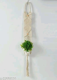 Macrame PCENFAP014 Multi Plant Pot Hanger, 2 TierName: Macrame Multi Plant Pot Hanger, 2 TierMaterial: FabricShape: ContemporaryType: HangingProduct Breadth: 6 InchProduct Height: 52 InchProduct Length: 6 InchNet Quantity (N): Pack Of 1Plant pot holder made in cotton macrame. - Brown