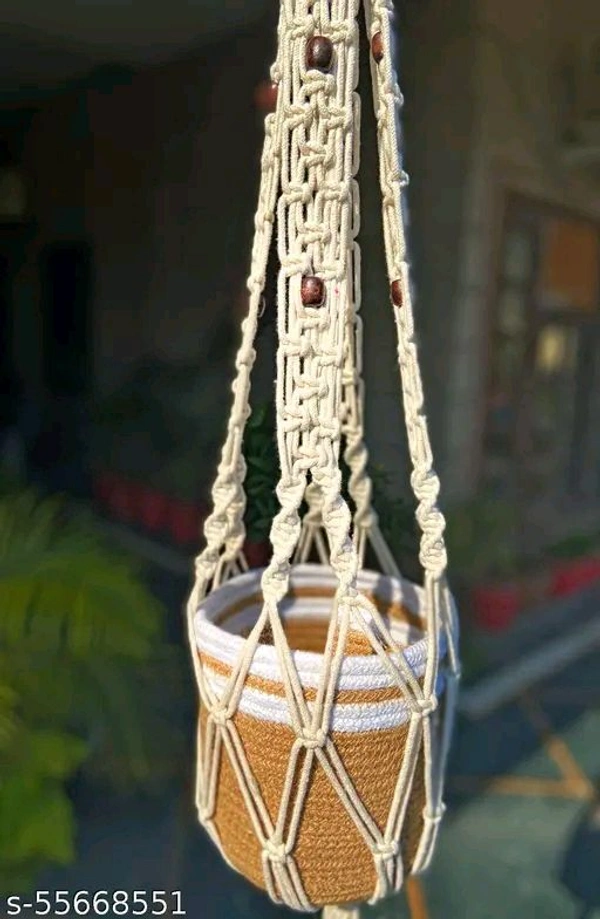 Macrame PCENFAP014 Multi Plant Pot Hanger, 2 TierName: Macrame Multi Plant Pot Hanger, 2 TierMaterial: FabricShape: ContemporaryType: HangingProduct Breadth: 6 InchProduct Height: 52 InchProduct Length: 6 InchNet Quantity (N): Pack Of 1Plant pot holder made in cotton macrame. - Brown