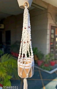 Macrame PCENFAP014 Multi Plant Pot Hanger, 2 TierName: Macrame Multi Plant Pot Hanger, 2 TierMaterial: FabricShape: ContemporaryType: HangingProduct Breadth: 6 InchProduct Height: 52 InchProduct Length: 6 InchNet Quantity (N): Pack Of 1Plant pot holder made in cotton macrame. - Brown