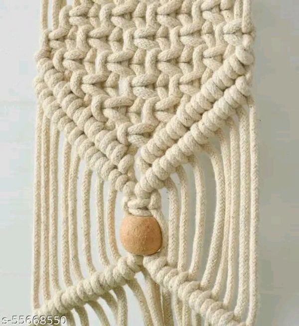 Macrame PCENFAP014 Multi Plant Pot Hanger, 2 TierName: Macrame Multi Plant Pot Hanger, 2 TierMaterial: FabricShape: ContemporaryType: HangingProduct Breadth: 6 InchProduct Height: 52 InchProduct Length: 6 InchNet Quantity (N): Pack Of 1Plant pot holder made in cotton macrame. - Brown