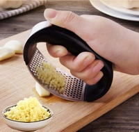 Garlic presser