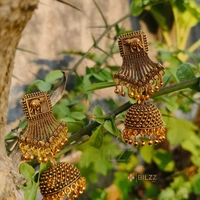 Gold Jhumka Earrings: Statement Ethnic Accessories