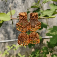Gold Jhumka Earrings: Statement Ethnic Accessories