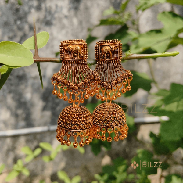Gold Jhumka Earrings: Statement Ethnic Accessories