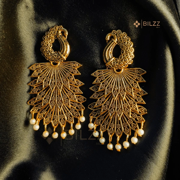 Golden Jhumka Earrings: Regal Beauty for Every Occasion