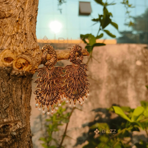 Golden Jhumka Earrings: Regal Beauty for Every Occasion