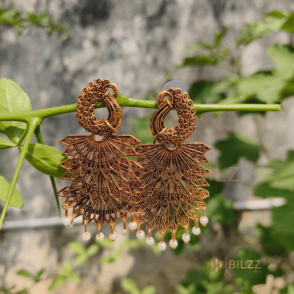 Golden Jhumka Earrings: Regal Beauty for Every Occasion