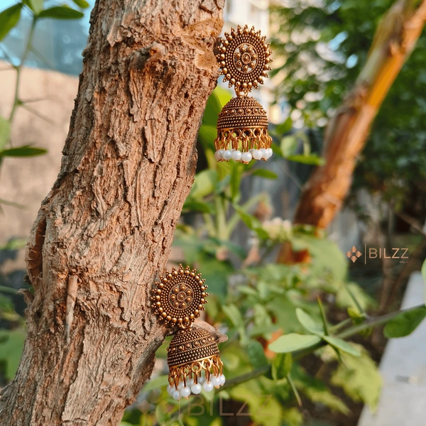 Golden Jhumka Earrings: Timeless Ethnic Charm with White Beads