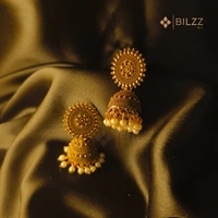 Golden Jhumka Earrings: Timeless Ethnic Charm with White Beads