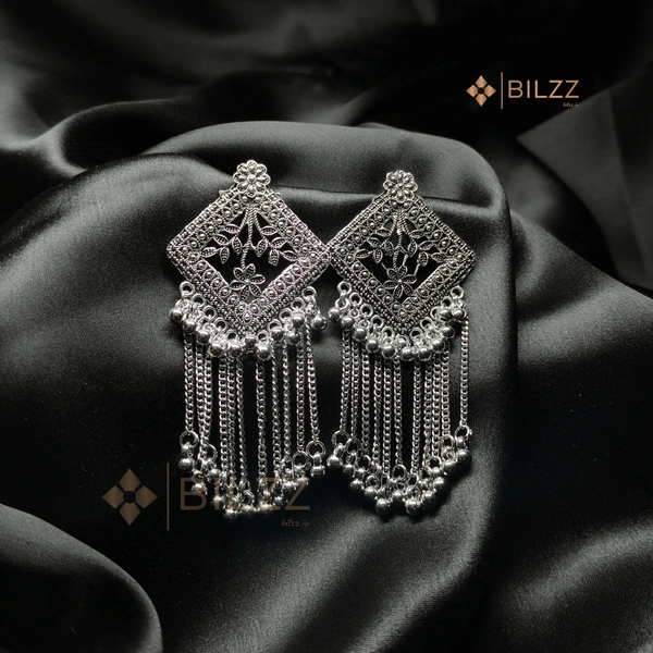 Shiny Silver Jhumka Earrings: Traditional Treasures