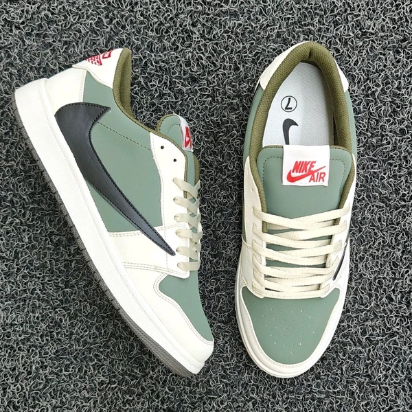Travis Scott Reverse Olive - UK6 / EU40