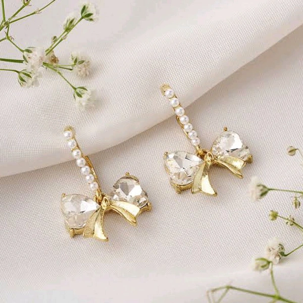 PEARL AND BOW DANGLER 