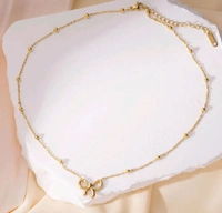 GOLDEN BOW BEADED NECKPIECE ( ANTI TARNISH - STAINLESS STEEL) 