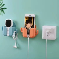 WALL MOUNTED MOBILE CHARGING HOLDER. WITH HANDS