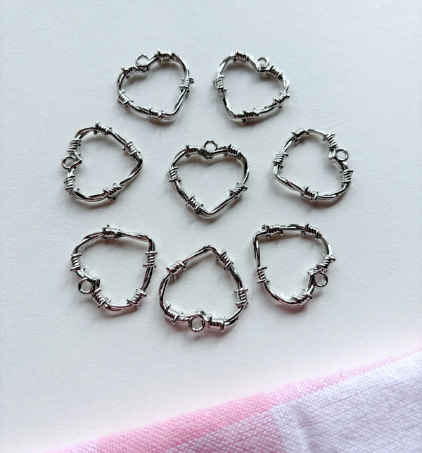 Metal Caged Heart Charm