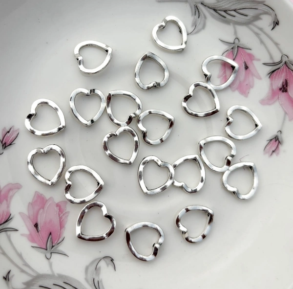 Metal Hollow Hearts Charm