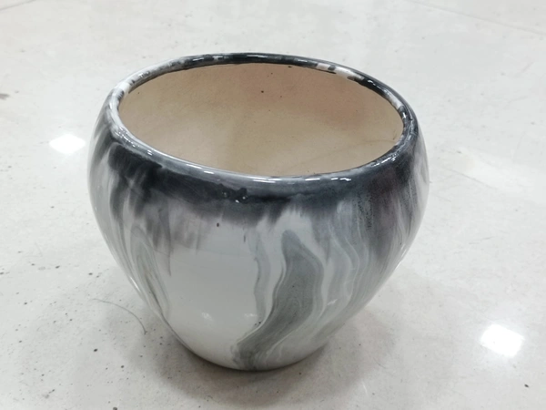 WHITE AND BLACK PLANTER POT