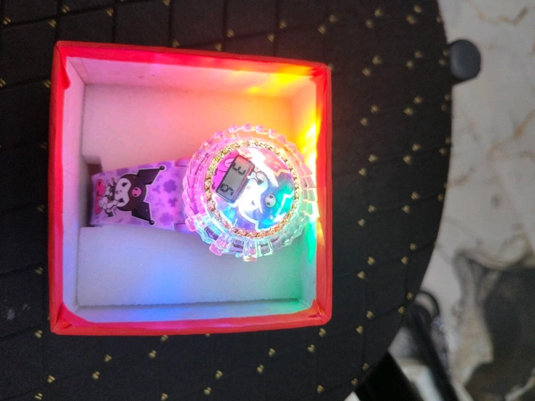 Light Rotating Music Watch