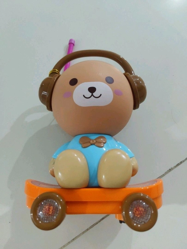 Cute Toy On Skateboard