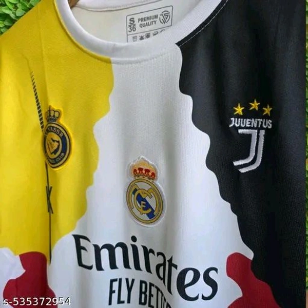 Cristiano Ronaldo Tribute Jersey
Celebrate the legendary career of Cristiano Ronaldo with this unique, multicolor tribute jersey. Featuring badges from all the iconic clubs he played for—Sporting CP, Manchester United, Real Madrid, Juventus, Al-Nassr—and the Portugal national team, this premium-quality tee showcases CR7's journey in style. Comfortable and Very eye-catching - Black, L