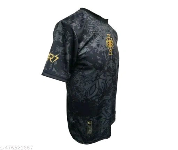 This premium black Portugal jersey with gold accents honors Cristiano Ronaldo. Featuring a GOAT emblem, number 7, and CR7 branding, it’s a sleek and powerful tribute to a football legend. - Black, XXL