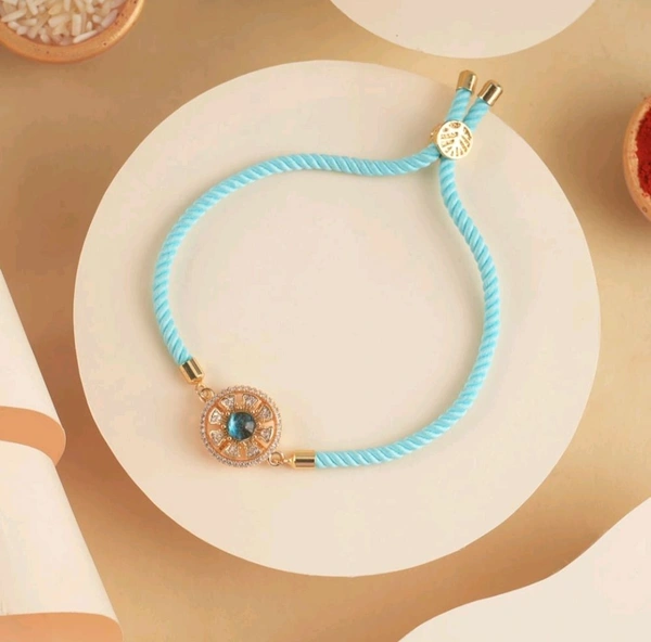 QuickPickDelhi A.D. Studded Bracelet Rakhi (Light Blue) By Shree Rakhi - Regent St Blue, 8×8×1.9