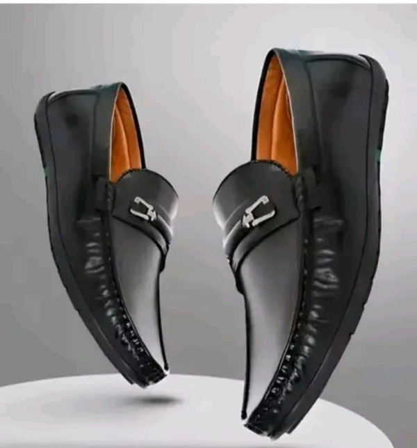 NEW_BLACK_LOAFER_102
Name: NEW_BLACK_LOAFER_102
Material: Synthetic
Sole Material: Pvc
Fastening: Slip On
Toe Shape: Round Toe
Net Quantity (N): 1
NEW_BLACK_LOAFER_102
IND-6 (Foot Length Size: 10 cm, Foot Width Size: 10 cm) 
IND-7 (Foot Length Size: 26.8 cm, Foot Width Size: 10.1 cm) 
IND-9 (Foot Length Size: 27.8 cm, Foot Width Size: 10.2 cm) 
IND-10  - 8