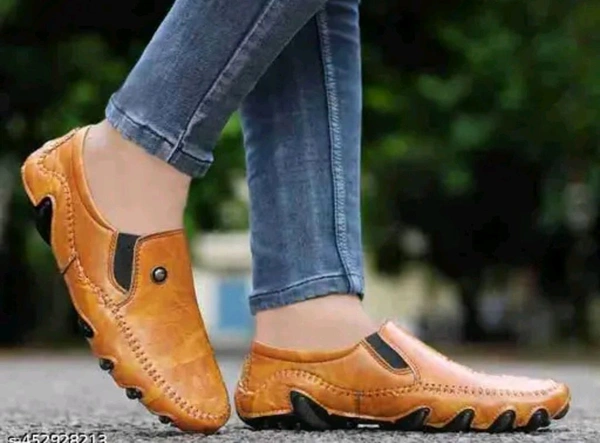AKIKO GB Loafers - TAN
Name: AKIKO GB Loafers - TAN
Material: Synthetic
Sole Material: Rubber
Fastening: Slip On
Toe Shape: Round Toe
Net Quantity (N): 1
Sizes: 
IND-6 (Foot Length Size: 25.4 cm, Foot Width Size: 10 cm) 
IND-7 (Foot Length Size: 26 cm, Foot Width Size: 10 cm) 
IND-8 (Foot Length Size: 27.3 cm, Foot Width Size: 10 cm) 
IND-9 (Foot Length Size: 27.9 cm, Foot - 9