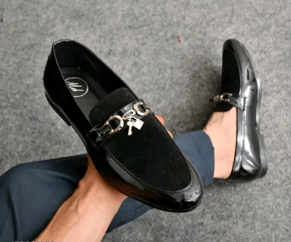 Premium New Look Black Loafer
Name: Premium New Look Black Loafer
Material: Synthetic
Sole Material: Pvc
Fastening: Slip On
Toe Shape: Round Toe
Sizes: 
IND-6 (Foot Length Size: 25 cm, Foot Width Size: 10 cm) 
IND-7 (Foot Length Size: 26 cm, Foot Width Size: 10.1 cm) 
IND-8 (Foot Length Size: 27 cm, Foot Width Size: 10.2 cm) 
IND-9 (Foot Length Size: 28 cm, Foot Width Size: 10.3  - 6