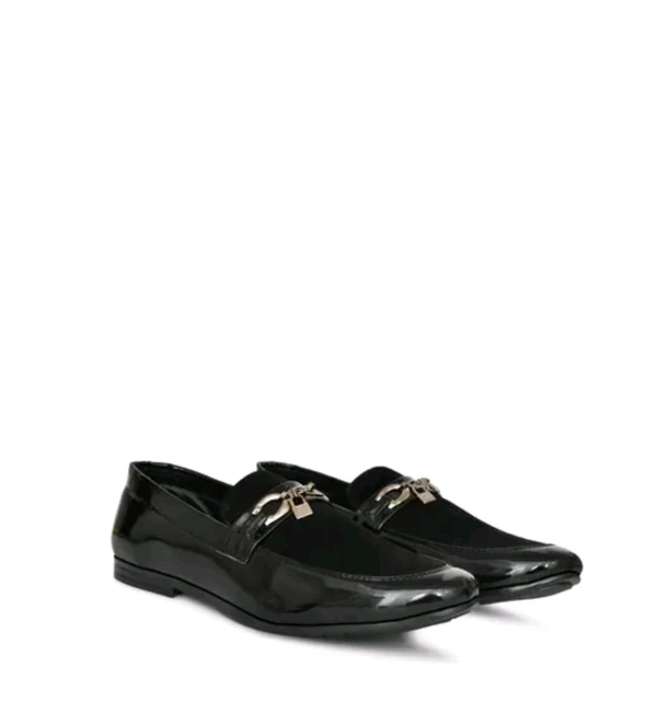 Premium New Look Black Loafer
Name: Premium New Look Black Loafer
Material: Synthetic
Sole Material: Pvc
Fastening: Slip On
Toe Shape: Round Toe
Sizes: 
IND-6 (Foot Length Size: 25 cm, Foot Width Size: 10 cm) 
IND-7 (Foot Length Size: 26 cm, Foot Width Size: 10.1 cm) 
IND-8 (Foot Length Size: 27 cm, Foot Width Size: 10.2 cm) 
IND-9 (Foot Length Size: 28 cm, Foot Width Size: 10.3  - 9