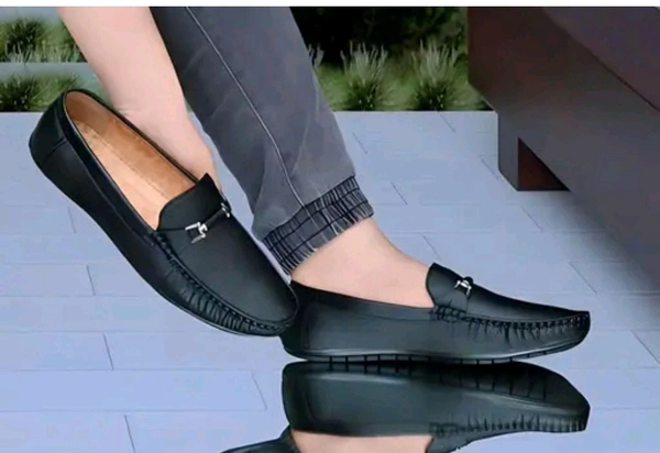 NEW TRENDY BLACK LOAFER
Name: NEW TRENDY BLACK LOAFER
Material: Synthetic
Sole Material: Pvc
IND-6 (Foot Length Size: 25 cm, Foot Width Size: 10 cm) 
IND-7 (Foot Length Size: 26 cm, Foot Width Size: 10.1 cm) 
IND-8 (Foot Length Size: 27 cm, Foot Width Size: 10.2 cm) 
IND-9 (Foot Length Size: 28 cm, Foot Width Size: 10.3 cm) 
IND-10 (Foot Length Size: 29 cm, Foot Width Size10. 4cm - 9