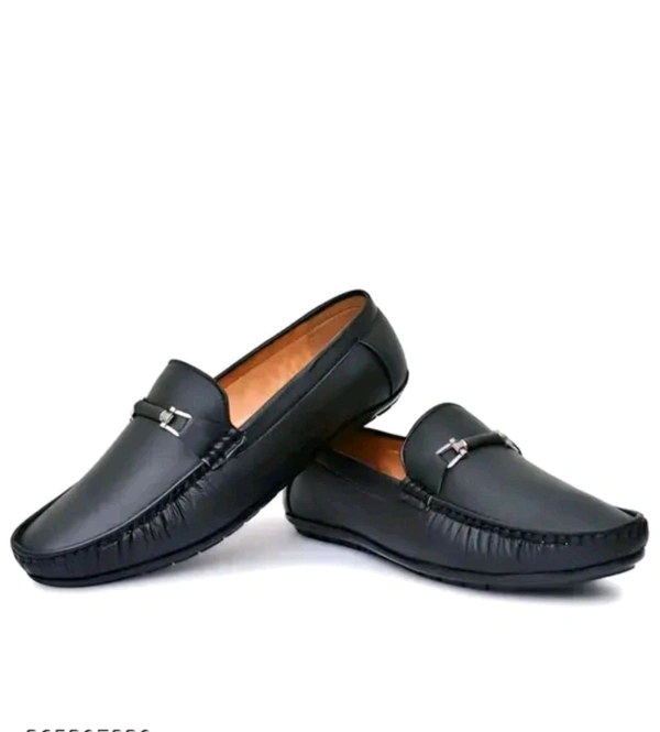NEW TRENDY BLACK LOAFER
Name: NEW TRENDY BLACK LOAFER
Material: Synthetic
Sole Material: Pvc
IND-6 (Foot Length Size: 25 cm, Foot Width Size: 10 cm) 
IND-7 (Foot Length Size: 26 cm, Foot Width Size: 10.1 cm) 
IND-8 (Foot Length Size: 27 cm, Foot Width Size: 10.2 cm) 
IND-9 (Foot Length Size: 28 cm, Foot Width Size: 10.3 cm) 
IND-10 (Foot Length Size: 29 cm, Foot Width Size10. 4cm - 10