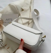 Effortless Elegance – Carry Confidence with Our White Chic Sling Bag 🤍✨ - White