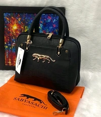 Product Detail.
2 partition inside 
One pocket front side
One pocket back side
Long adjustable belt
Pu vegan leather material 

Size - 8 by 10 inches approx 

