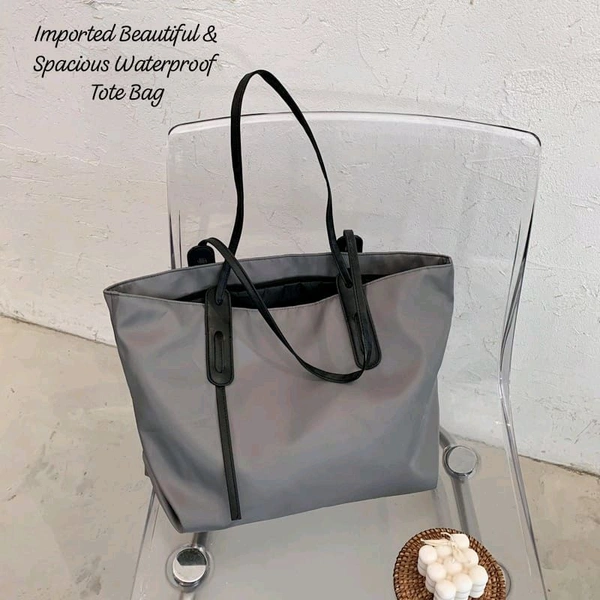 Imported Beautiful & Spacious Waterproof Tote Bag
KOREAN EDITION STYLISH FANCY BAG*

Size:- *11.5 x 18 INCHES 
