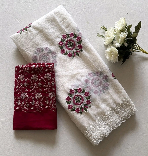 Pure crush Georgette chiffon  Saree with premium floral embroidery all over the Saree with scallop embroidery Border
Blouse:- contrast lucknowi Sequence embroidery blouse.