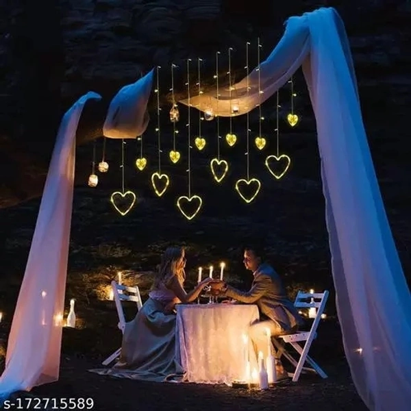 URBAN KENDRAA String Lights- 12 Heart 138 LED Curtain String Lights with 8 Flashing Modes Led Light for Home Decoration, Diwali Light (Heart Shape Curtain Light Warm-White) - Free Size