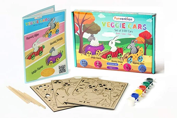 Funvention | Veggie Cars (Set of 3 DIY Vegetables Shaped Cars) Build, Color & Play DIY Puzzle Toy Cars for Kids Art & Craft Toy - Multi, Yes, No, Engineered MDF Wood, 24.8 x 18 x 3.2 cm, Funvention, 300 grams, Shipping Charges will be added during checkout. Order will be shipped within 2-4 working days. Delivery time may vary due to COVID-19 , rainy season and delivery location.  TrackingID will be provided  to check the  real time status of delivery. For any further queries related to order, Kindly send wh